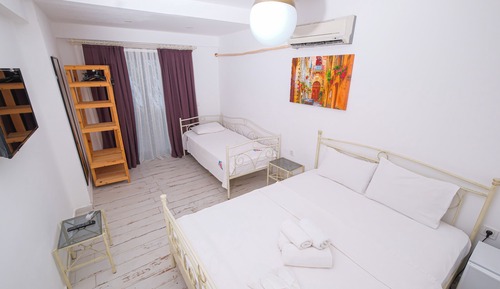 Habitación triple familiar, varias camas (1)