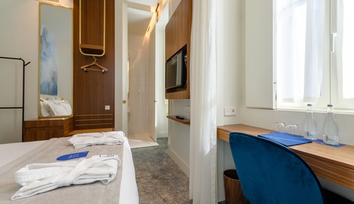 Habitación clásica con 1 cama doble o 2 individuales, vistas a la ciudad