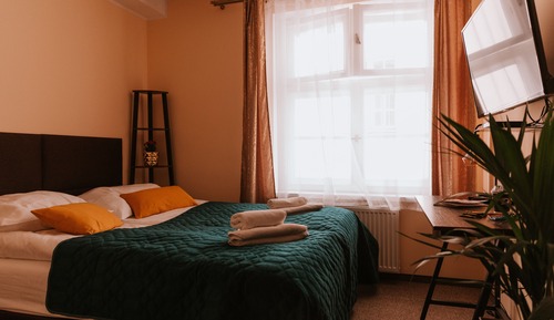 Habitación estándar con 1 cama doble o 2 individuales