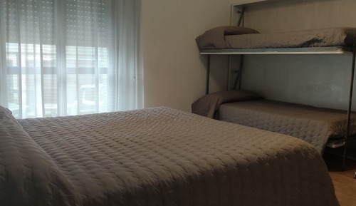 Habitación cuádruple superior, varias camas