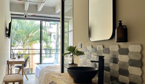 Habitación Elite con 1 cama doble o 2 individuales