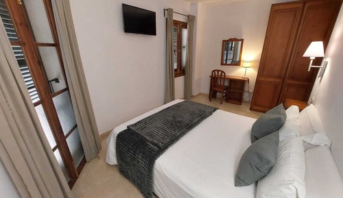 Habitación estándar con 1 cama doble o 2 individuales