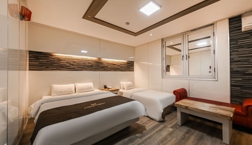Room (Deluxe twin (double + single/styler e)
