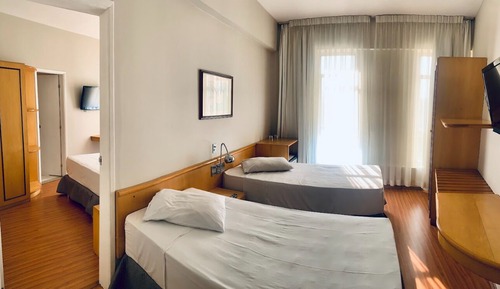 Habitación familiar, varias camas