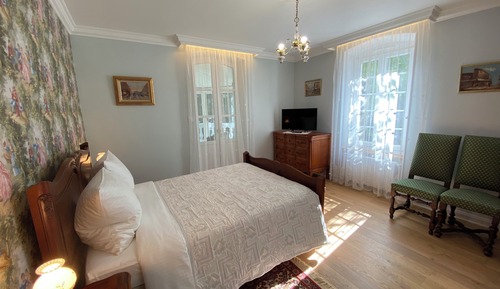 Suite presidencial, baño privado, vistas al parque