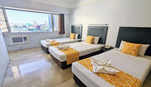 Habitación Premium, varias camas