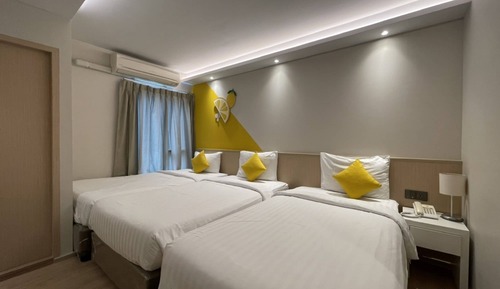Habitación triple Deluxe
