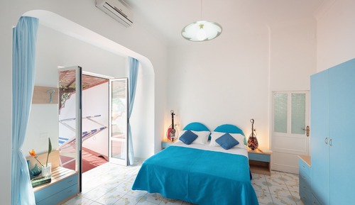 Habitación triple, vistas al mar
