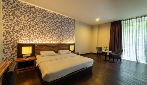 Habitación superior, vistas al jardín