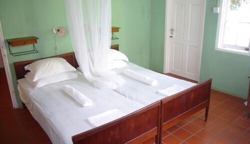 Habitación triple, vistas al mar