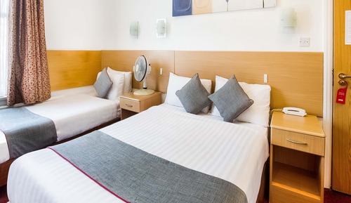 Habitación cuádruple Deluxe, varias camas