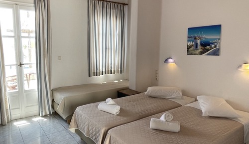 Habitación triple, vistas al mar