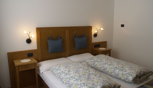 Habitación superior con 1 cama doble o 2 individuales