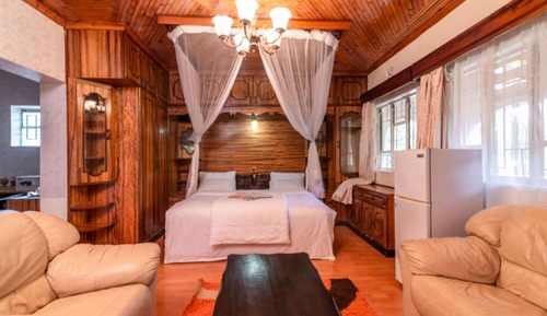 Suite ejecutiva, 1 cama de matrimonio grande, vistas al jardín