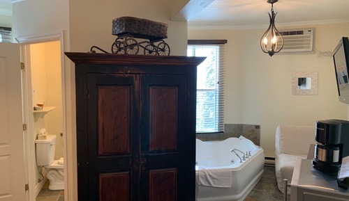 Habitación, 1 cama de matrimonio grande con sofá cama, bañera de hidromasaje