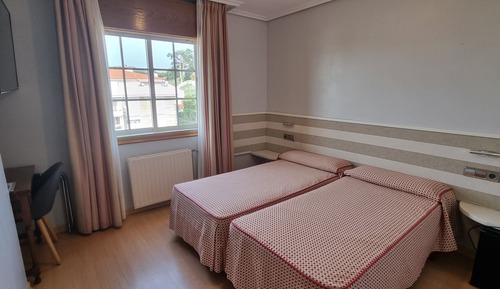 Habitación estándar con 1 cama doble o 2 individuales