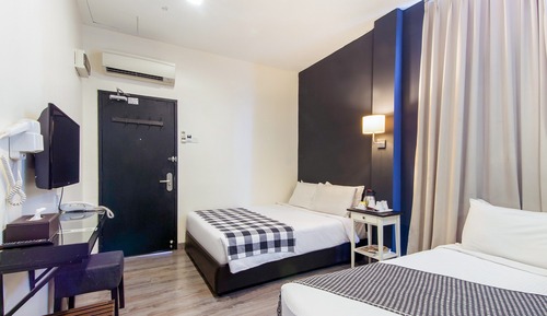 Habitación triple Deluxe