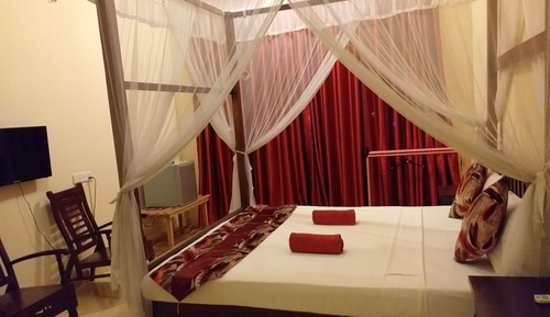 Habitación triple Deluxe, balcón