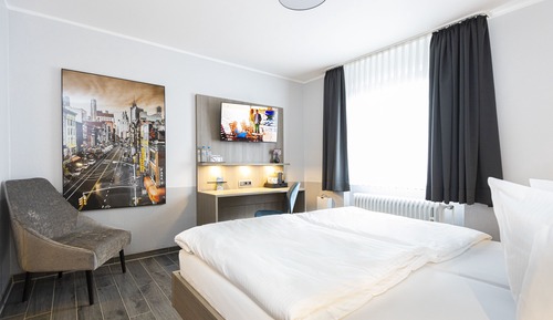 Habitación Confort con 1 cama doble o 2 individuales