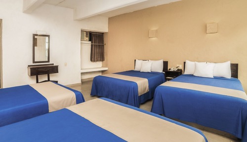 Habitación cuádruple estándar, varias camas