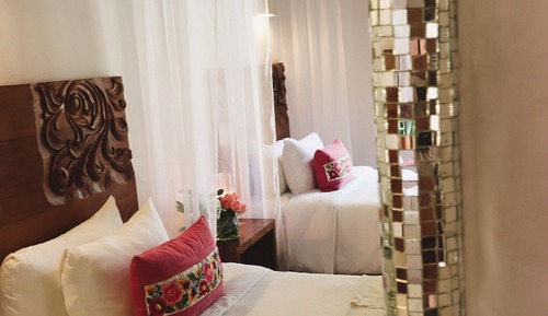 Habitación cuádruple Deluxe, vistas al jardín