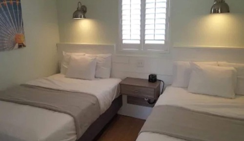 Suite familiar, 1 habitación, cocina básica, vistas parciales al mar