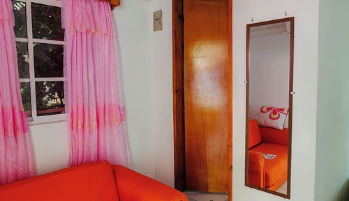 Habitación doble superior, 1 cama doble, baño privado, vistas parciales al mar