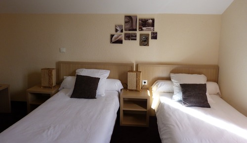 Habitación superior con 2 camas individuales