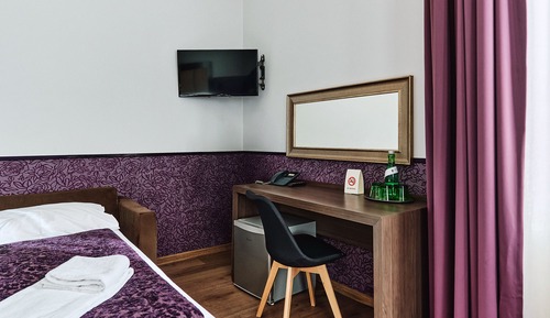 Habitación cuádruple superior, varias camas