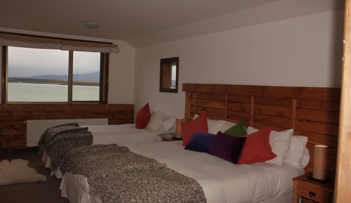 Habitación triple, vistas al mar