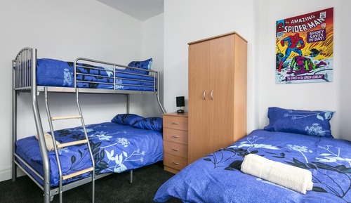 Habitación familiar, varias camas