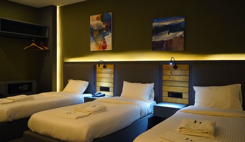 Habitación triple Deluxe