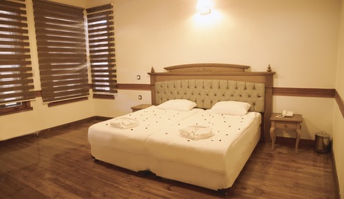 Habitación junior con 1 cama doble o 2 individuales