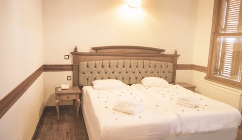 Habitación superior con 1 cama doble o 2 individuales