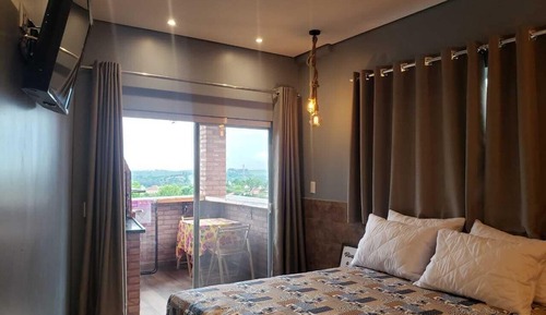 Loft superior, 1 habitación, frigorífico y microondas, planta baja