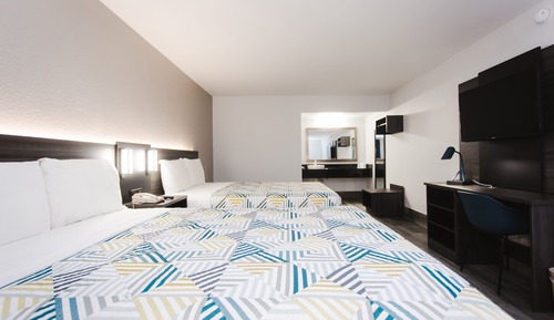 Habitación Deluxe, 2 camas de matrimonio, no fumadores, cocina básica