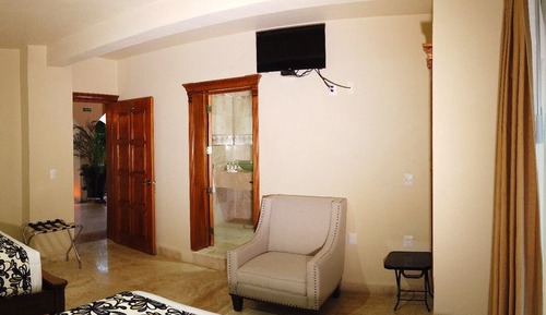 Habitación cuádruple Deluxe