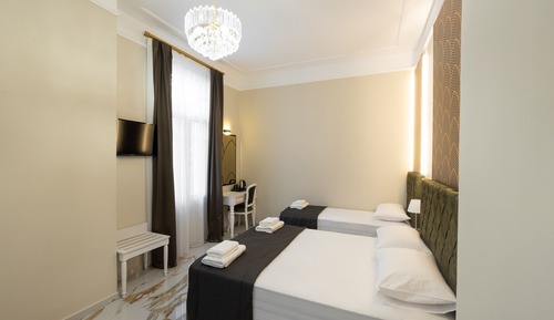 Habitación triple Deluxe