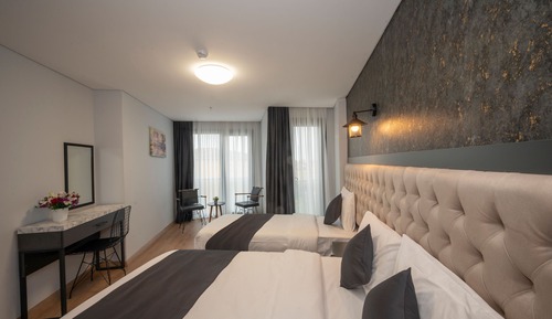 Suite Deluxe, varias camas