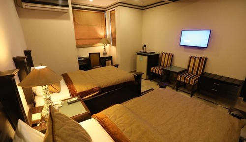 Habitación triple Deluxe