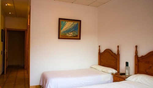 Habitación con 2 camas individuales