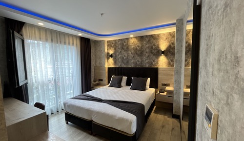 Habitación Confort con 1 cama doble o 2 individuales