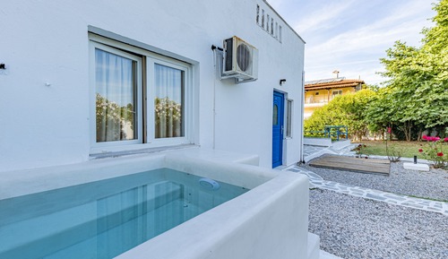 Habitación cuádruple junior, varias camas, bañera de hidromasaje, vistas al jardín