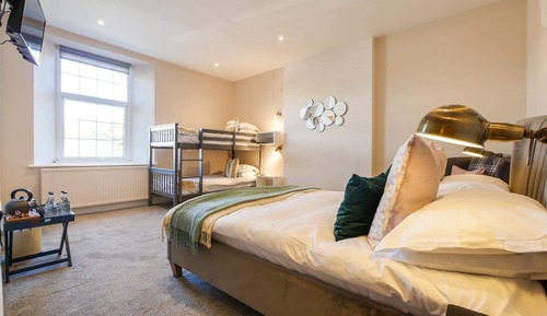Habitación cuádruple Deluxe