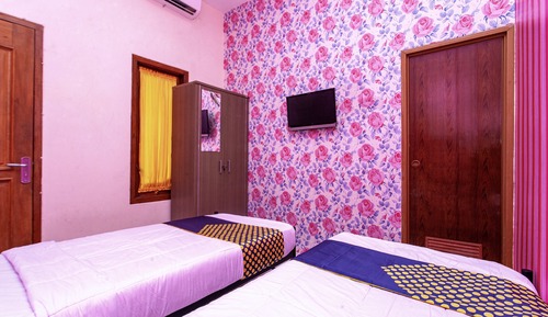 Habitación básica con 2 camas individuales