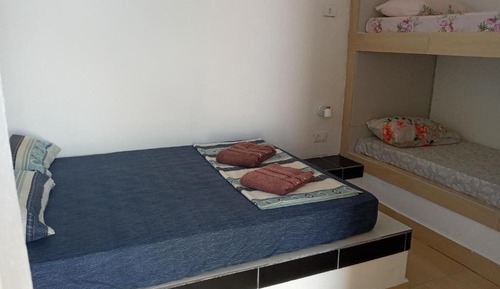Habitación exclusiva, varias camas