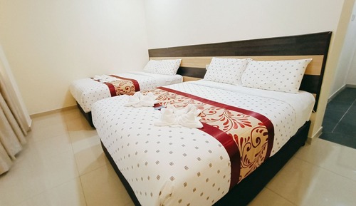 Habitación cuádruple Deluxe
