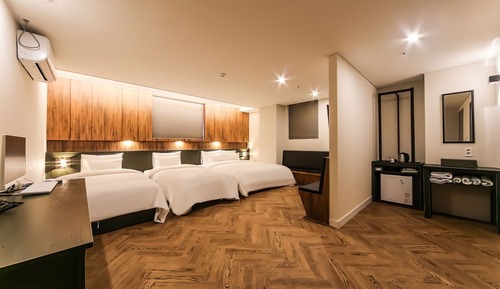 Habitación triple Grand