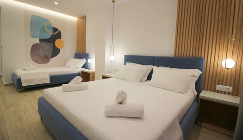 Habitación triple Deluxe, vistas al mar, junto a la playa
