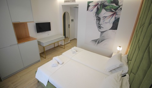 Habitación Deluxe con 1 cama doble o 2 individuales, vistas a la ciudad, junto a la playa